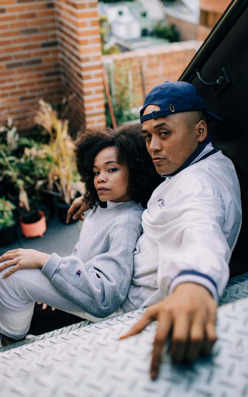 sitting couple on stairs