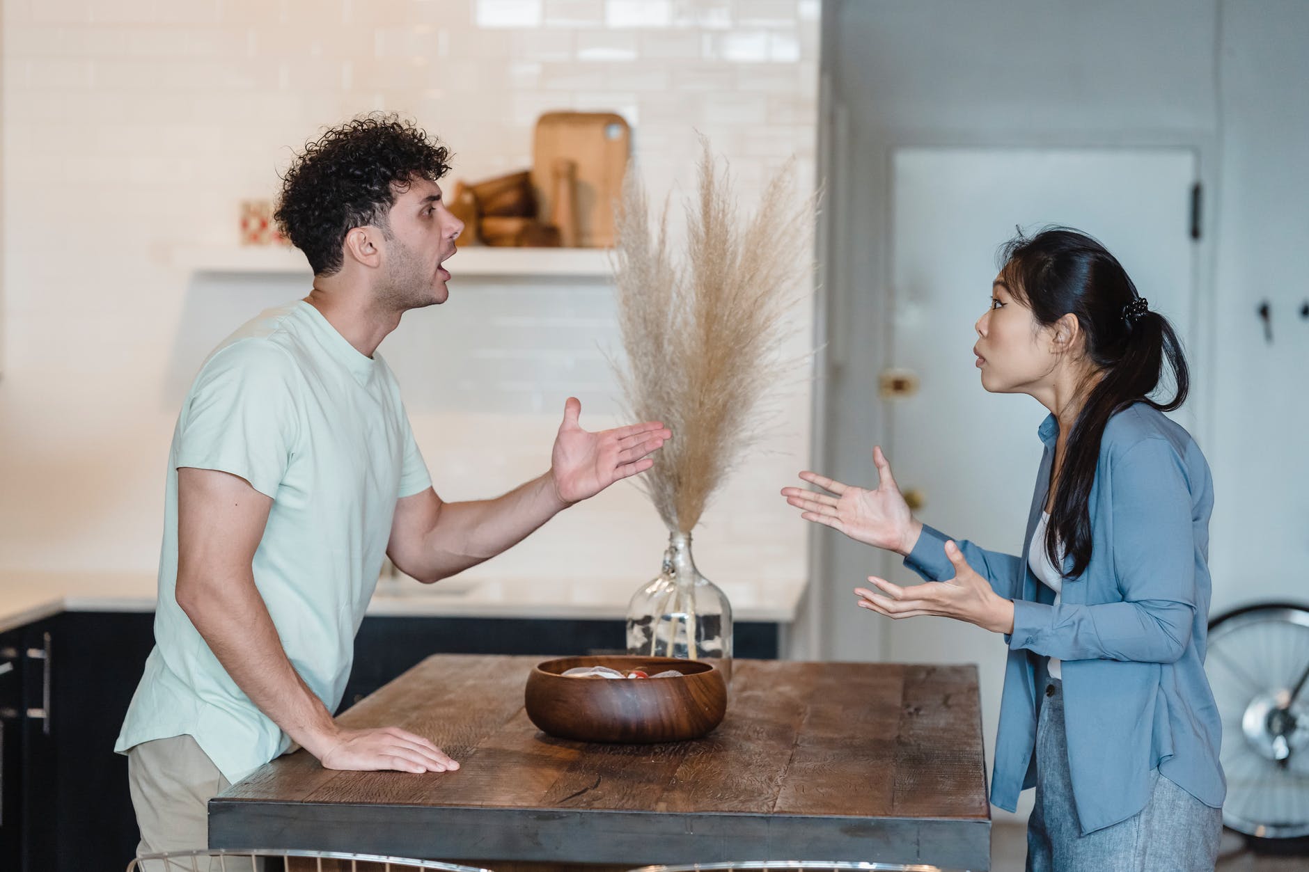 a couple talking while arguing