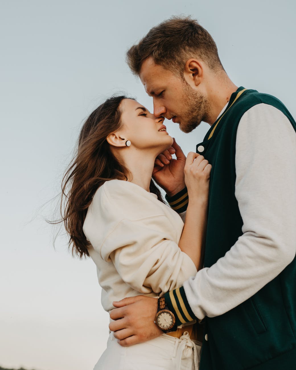 loving couple kissing on street